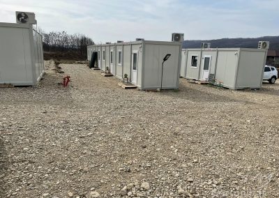 Three rows of living containers