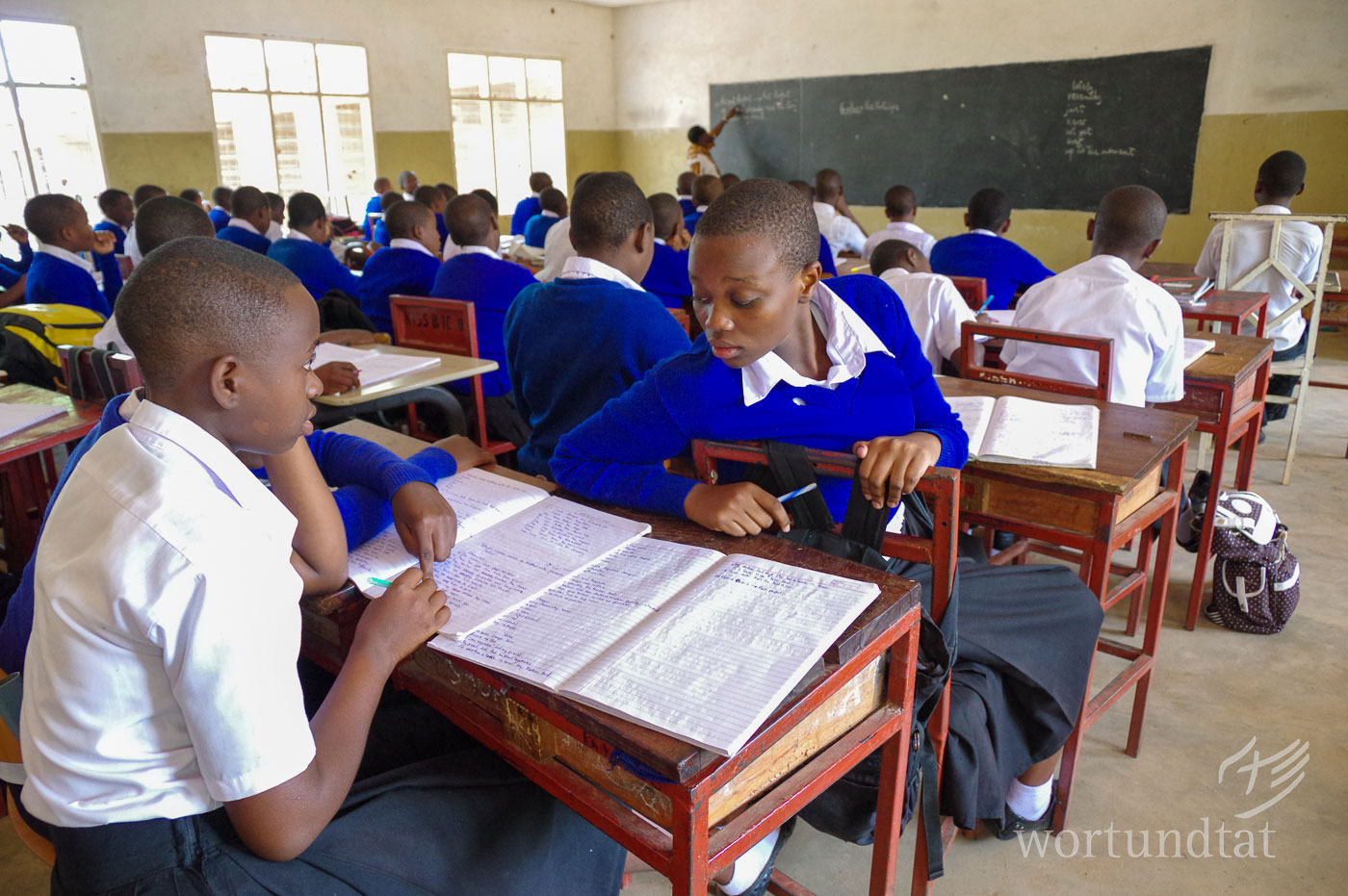 Girls have just as good educational opportunities as boys in KIUMA. School class with female students in KIUMA