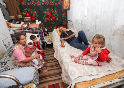 Senior couple with grandchildren in down room Republic of Moldova