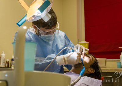 Dentist with patient in Greek health project